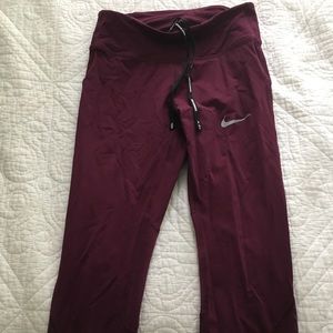 Maroon Nike running leggings